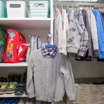 Inspired Closets walk in closet with shelves for clothes and other belongings and clothing racks