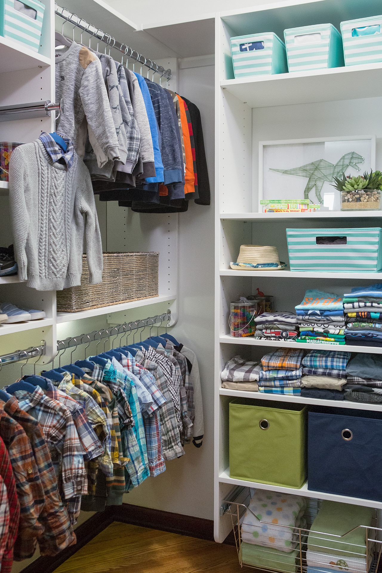 Inspired Closets walk in closet with shelves for clothes and other belongings and clothing racks