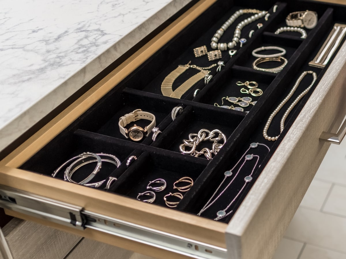 Drawer pulled out revealing jewelry inside