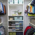 Inspired Closets walk in closet with shelves and clothing racks
