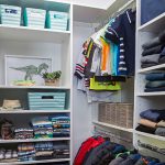 Inspired Closets walk in closet filled with belongings