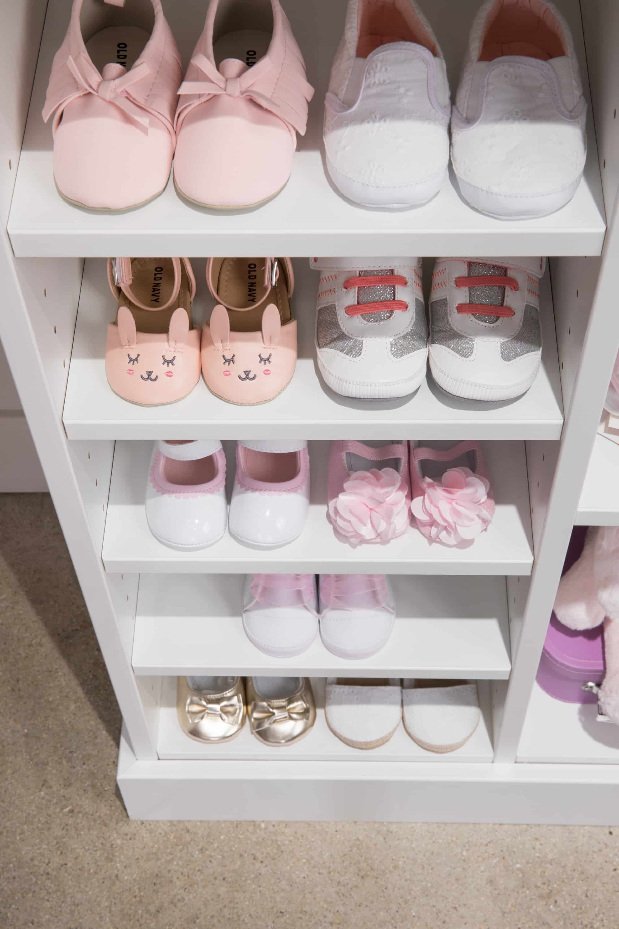 Girls shoes placed on shelves