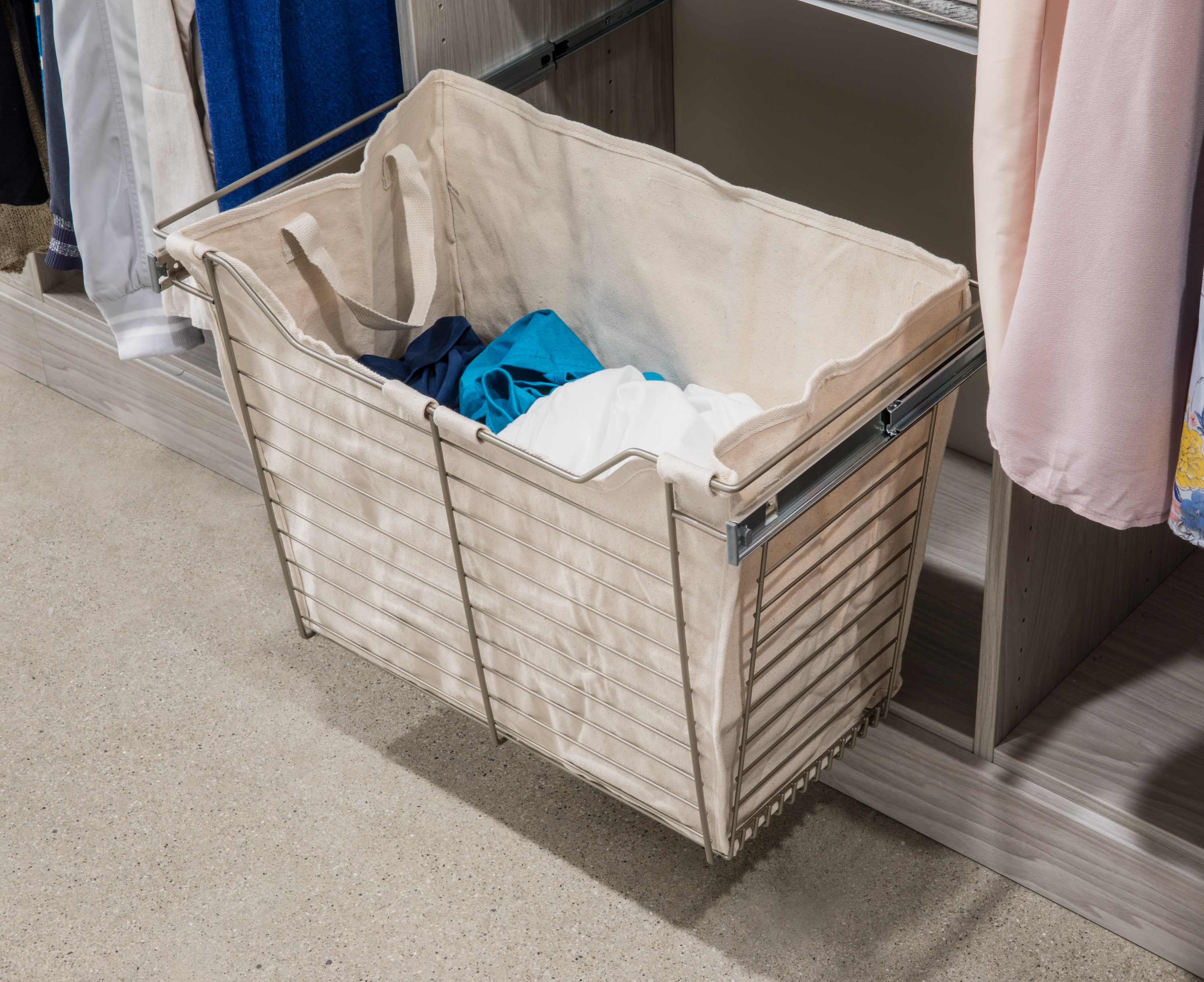 Drawer pulled out showing clothing hamper