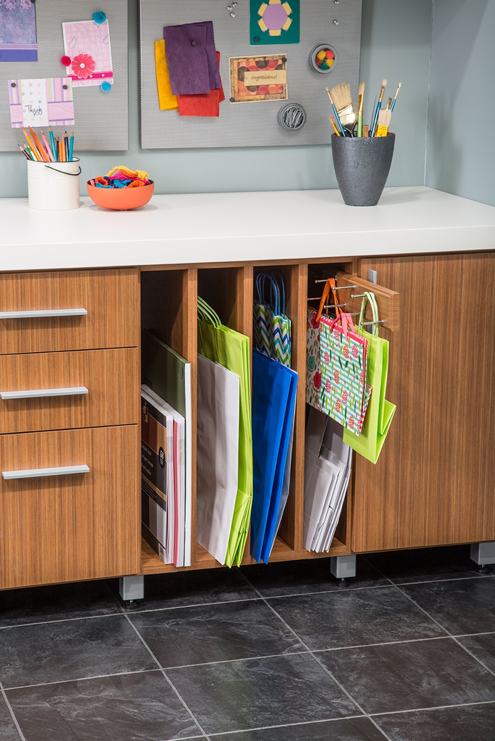 Shelves with folded up gift bags