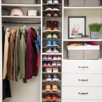 Shoe shrine entryway with shoe shelves, clothing rack, drawers and shelves for other articles