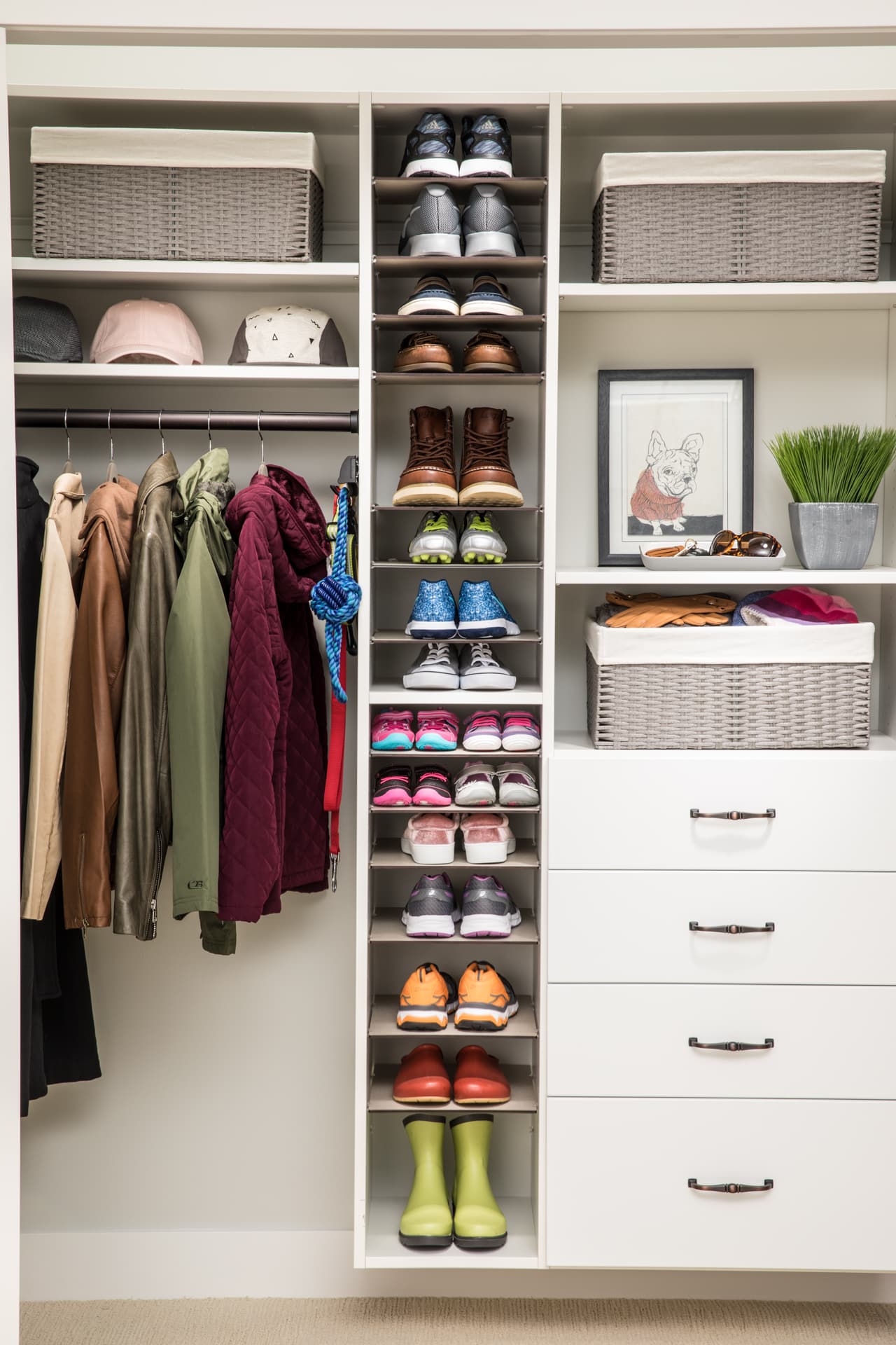 Shoe shrine entryway with shoe shelves, clothing rack, drawers and shelves for other articles