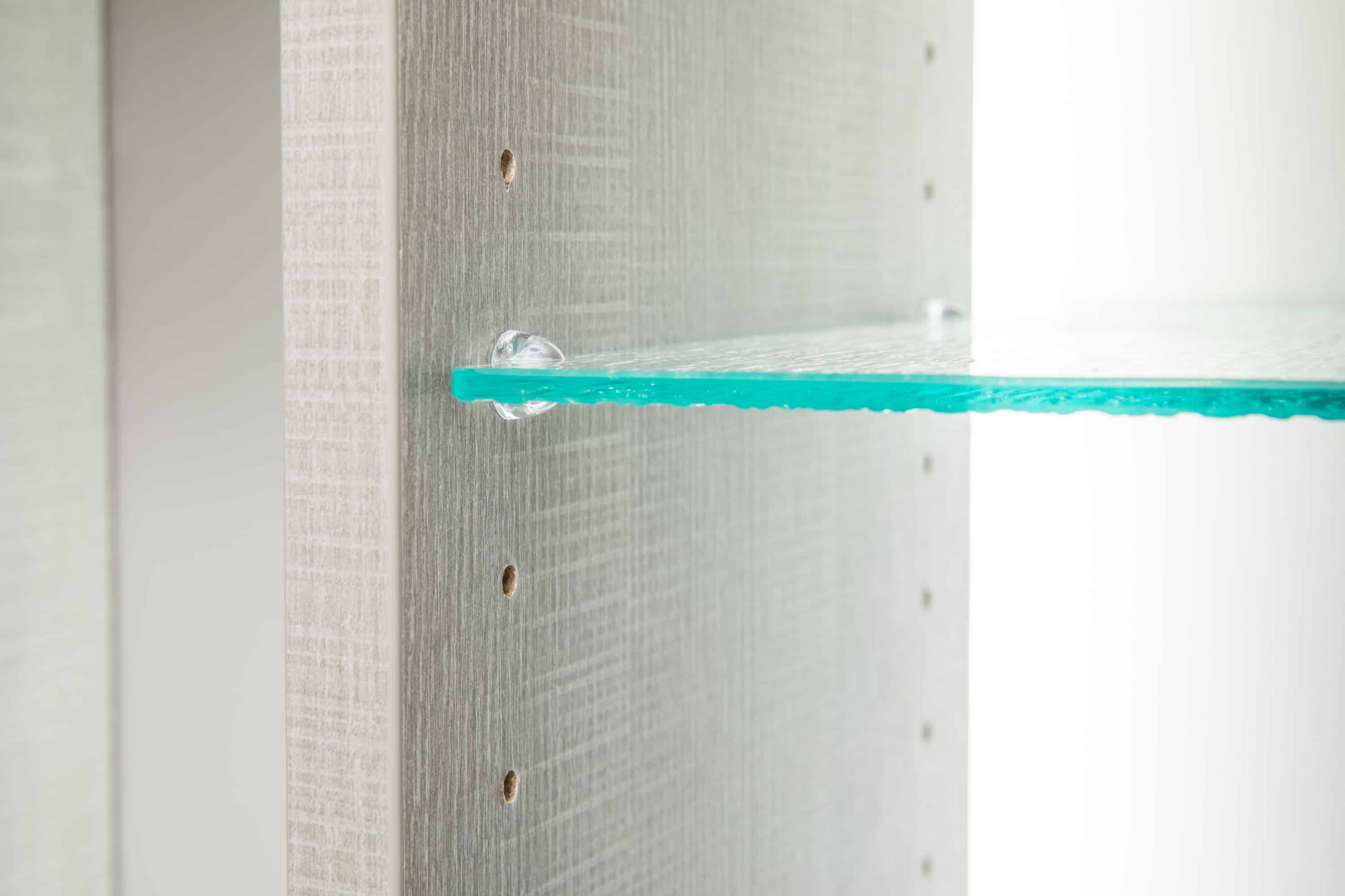 Close up of glass shelf in closet