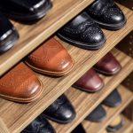 Close up of men's shoes on shelves