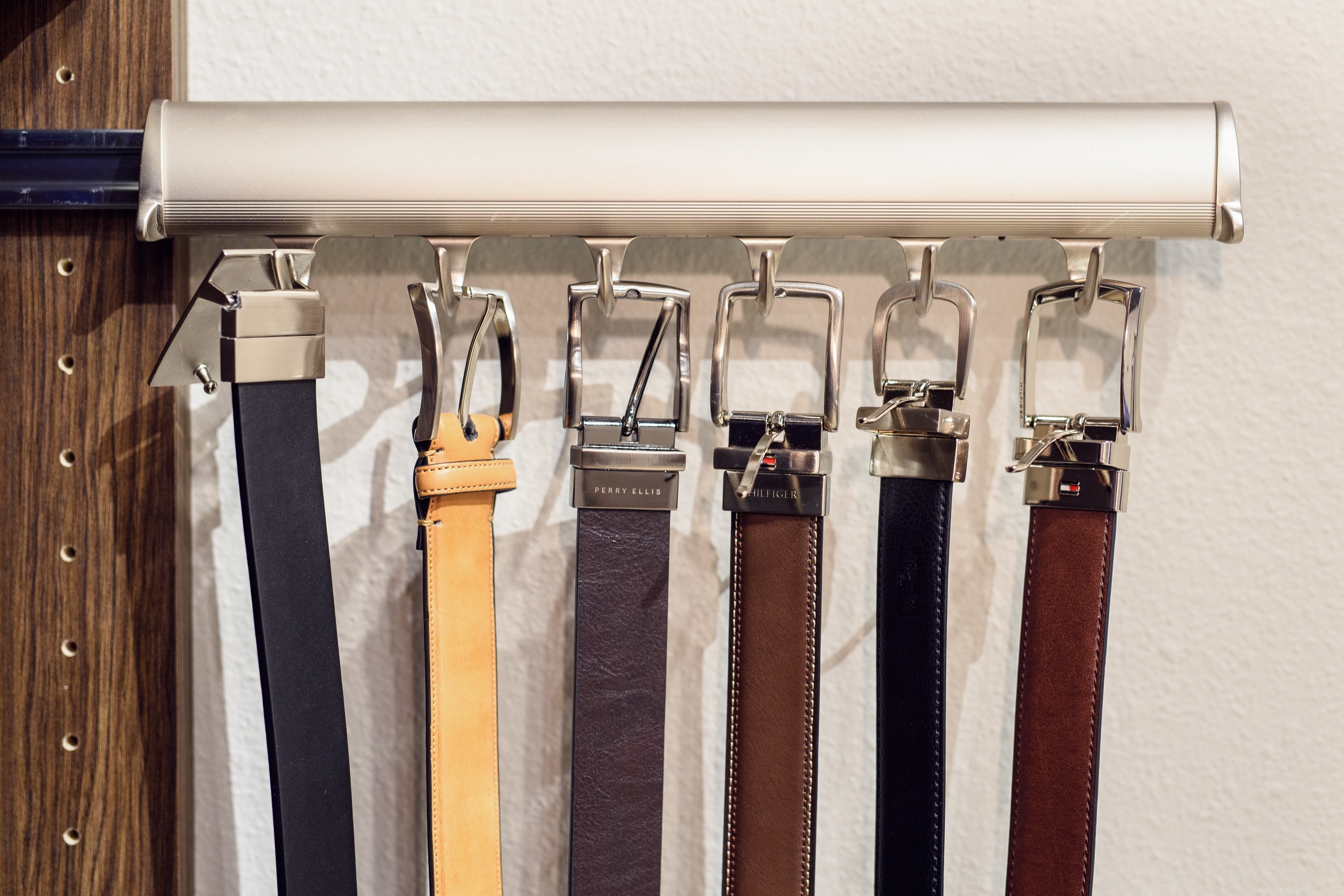 Close up of belt rack in reach in closet