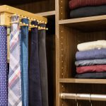 Reach in closet featuring tie rack