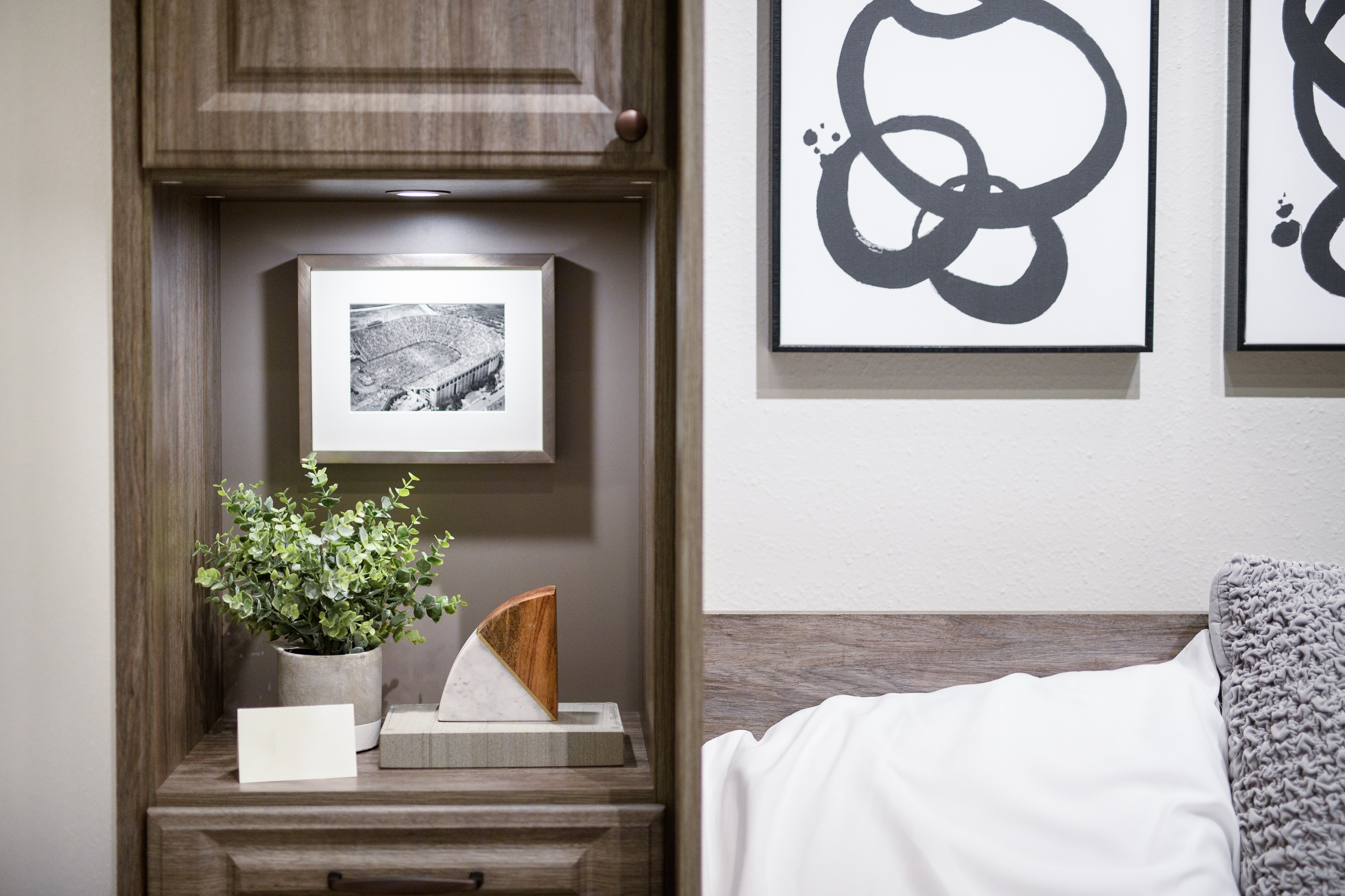 Shelf of murphy bed with items on top