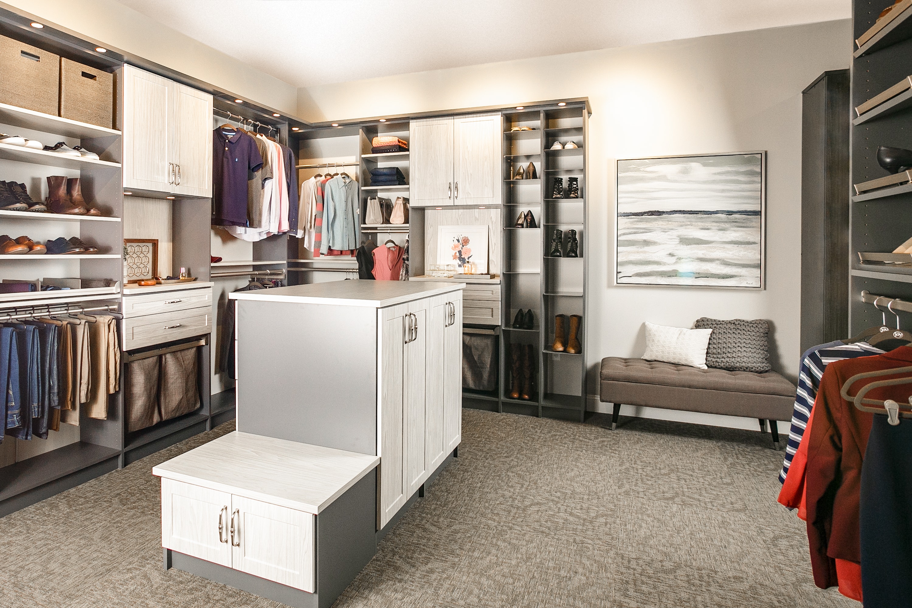 Side view of closet showing shelves, clothing racks and drawers