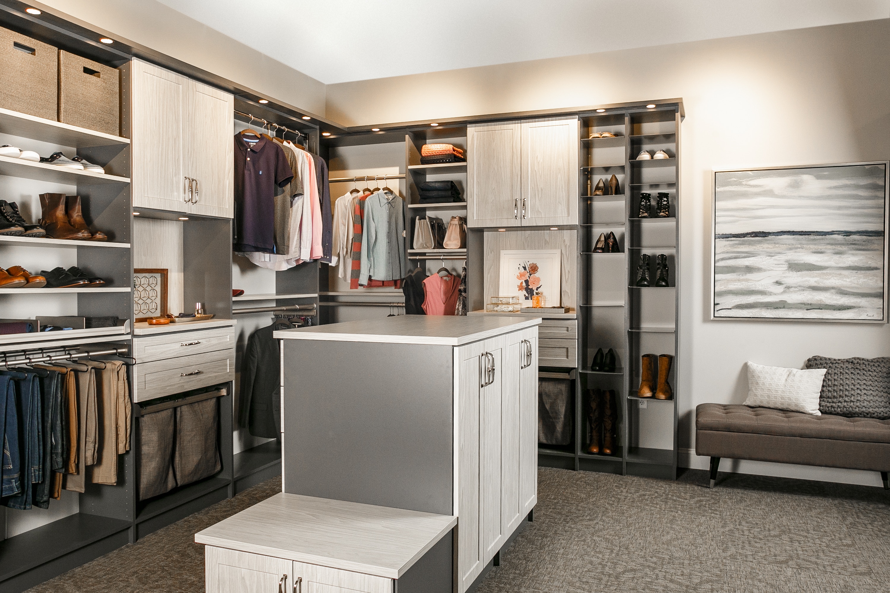 Side view of closet showing shelves, clothing racks and drawers