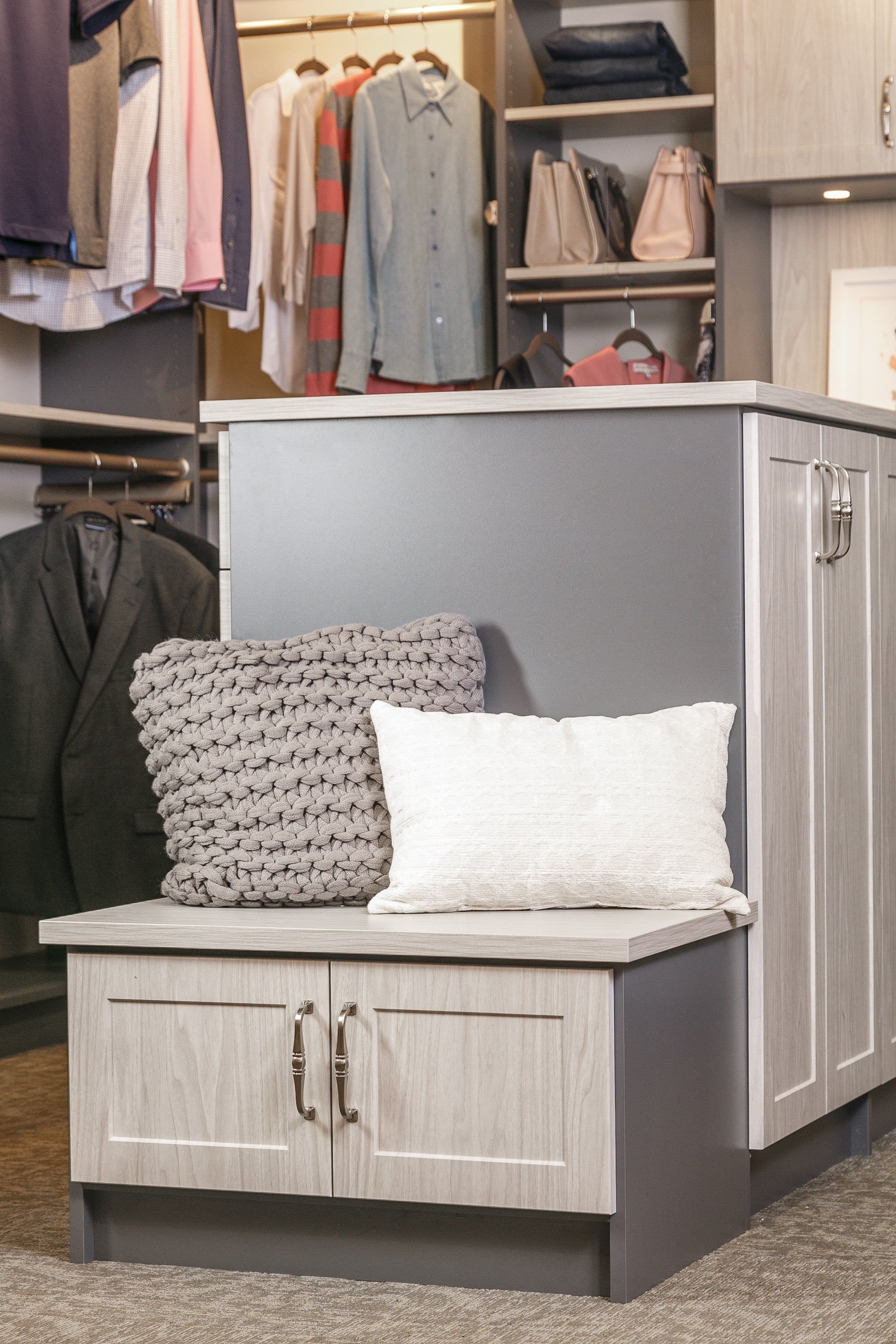 Close up of cabinets in center of closet