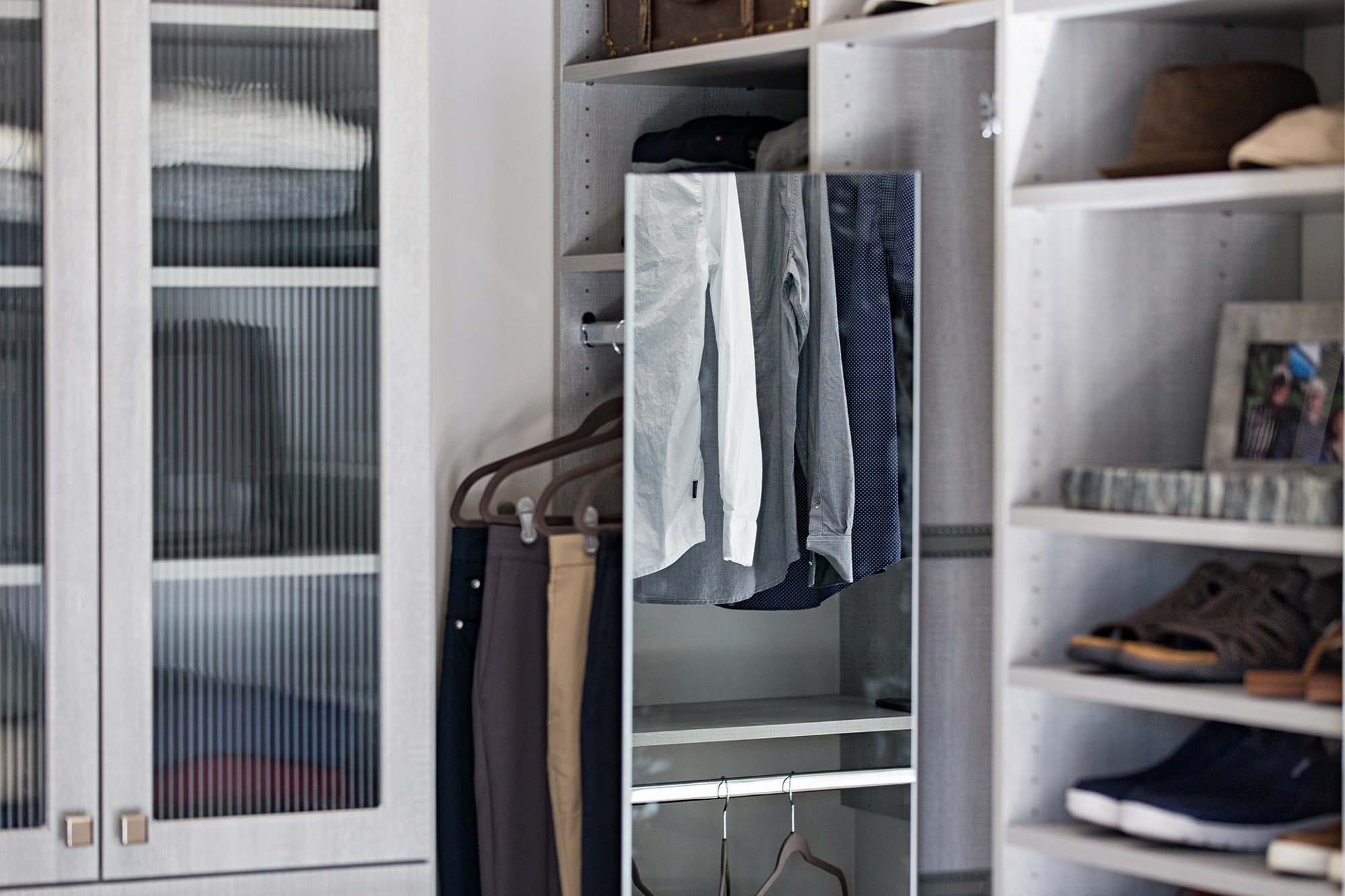 Custom Wood Closet with Mirror and Shoe Storage in Naples, FL