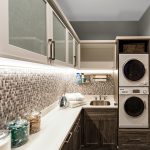 Laundry room with cabinets and space for washer and dryer
