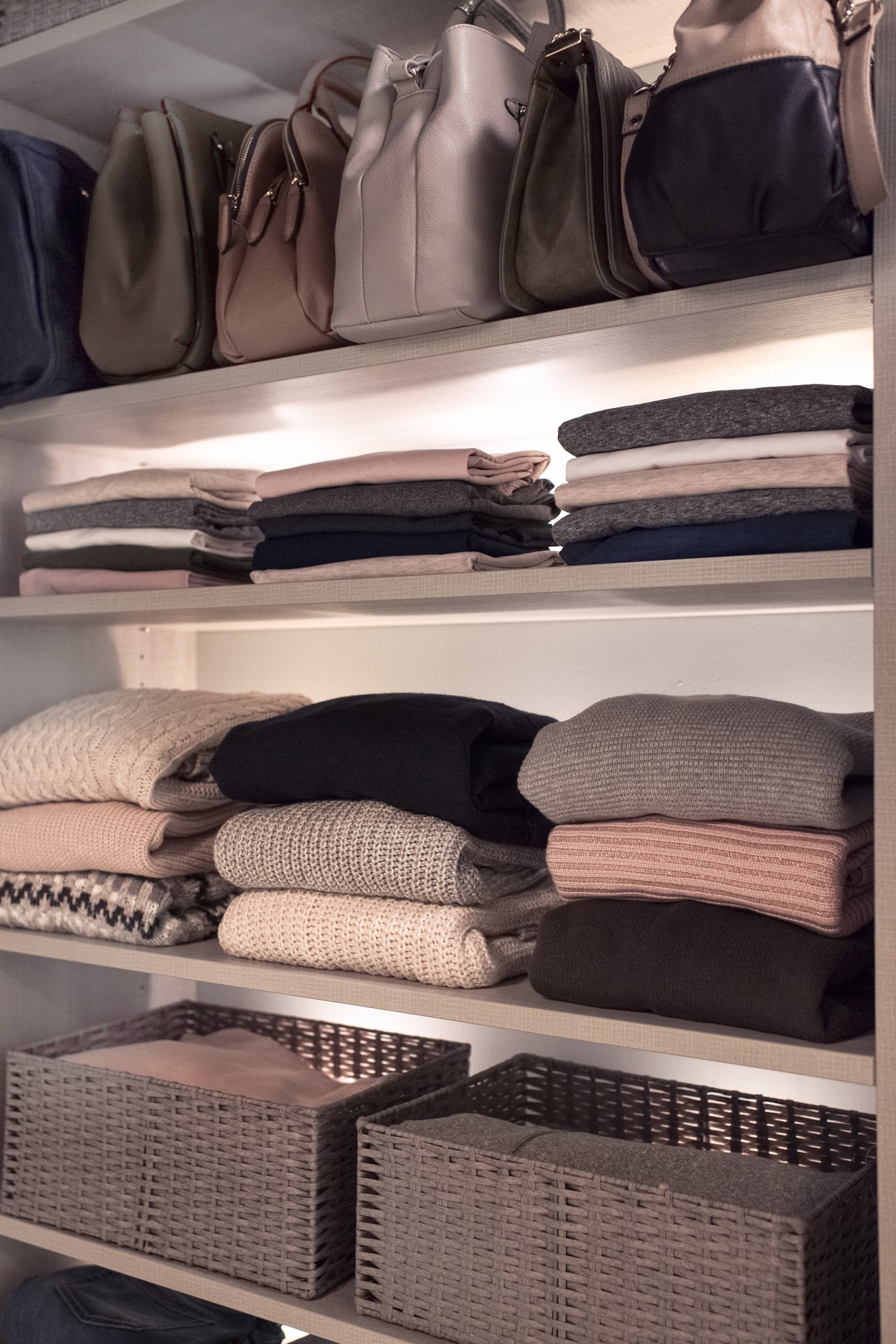 Close Up of Shelves with Clothing and Hand bags on them