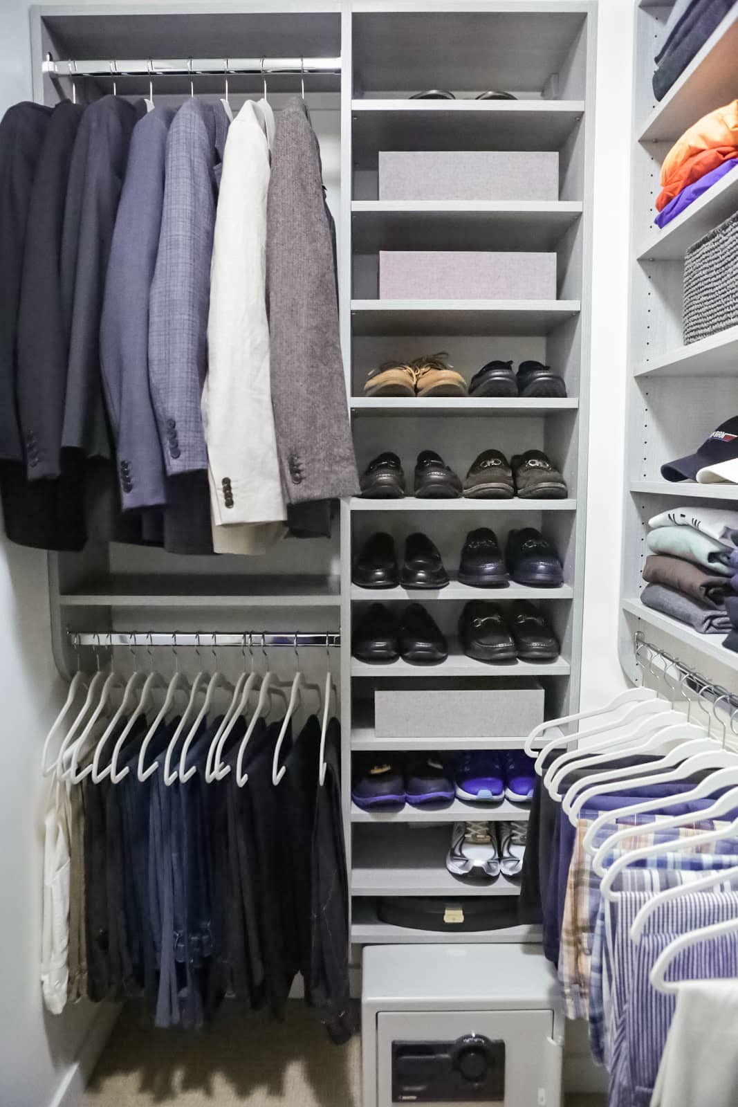 Close up of Inspired Closets closet with shelves and clothing racks