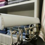 Close up of Inspired Closets belt rack