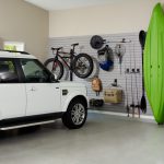 Garage with closets by Inspired Closets on the walls
