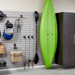 Inspired Closets closet in garage with wall racks