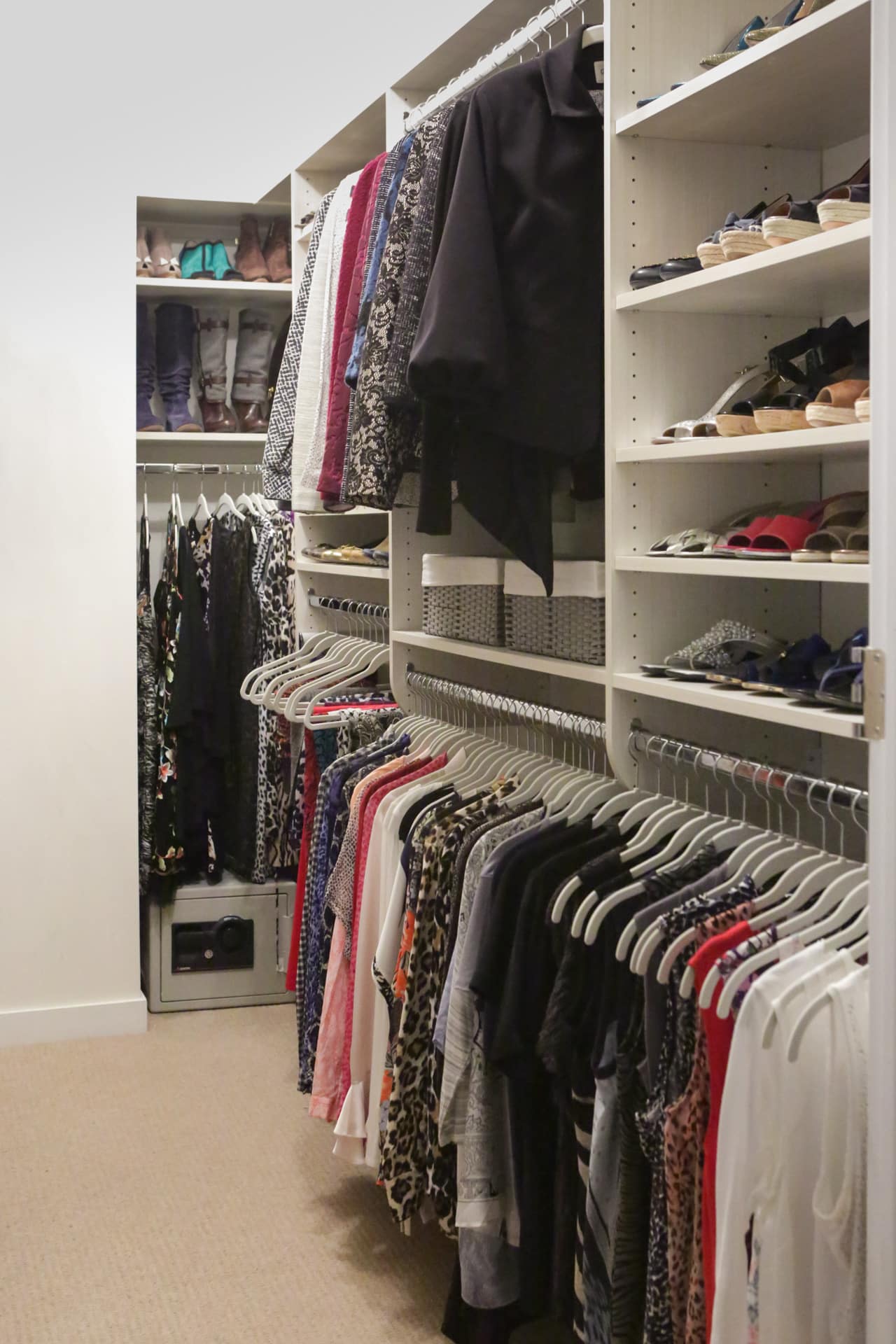 Inspired Closets closet with shelves, drawers and clothing racks