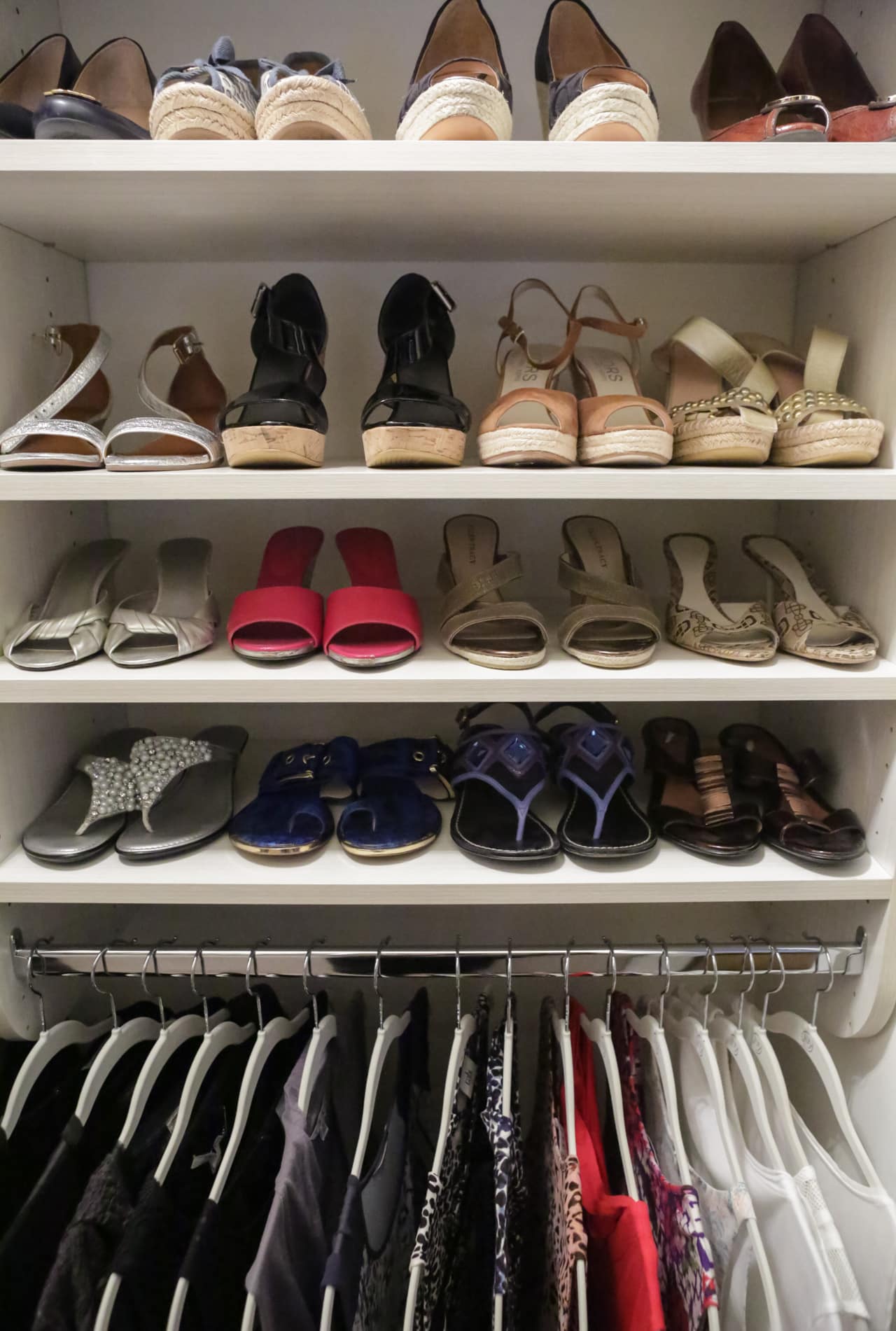 Inspired Closets closet with shelves and clothing racks