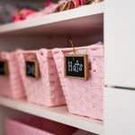 Close up of Inspired Closets bedroom closet with girls accessories inside