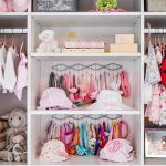Close up of Inspired Closets bedroom closet with girls accessories inside