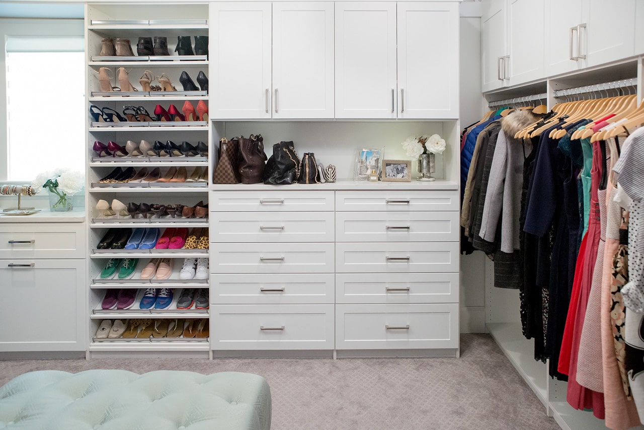 Inspired Closets closet with shoe shelves, clothing shelves, clothing racks and drawers