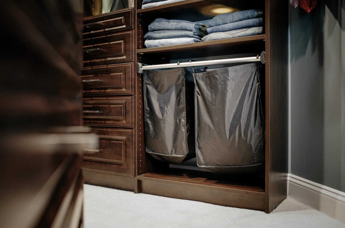 Inspired Closets closet with space for clothes hamper