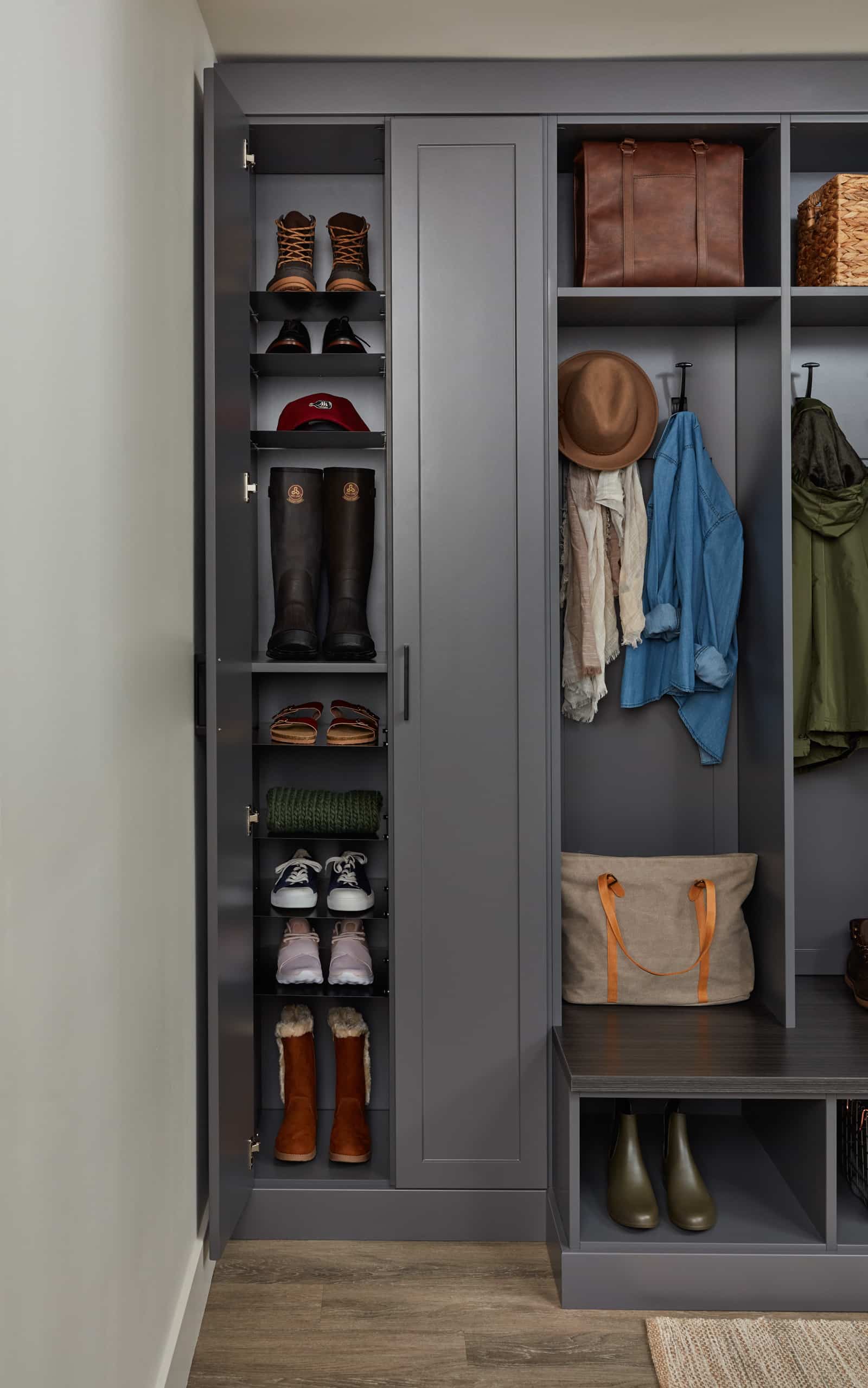 Closet showing items on hooks and shelves