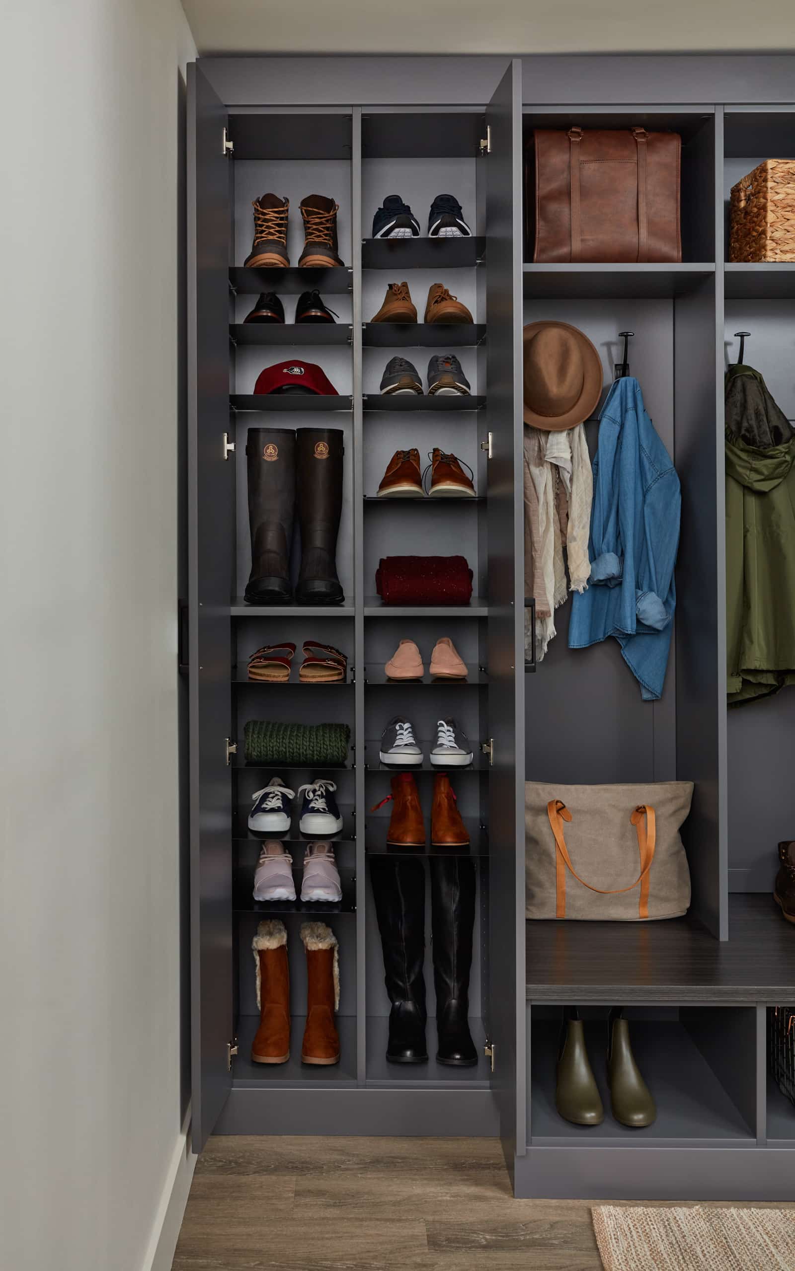Closet showing items on hooks and shelves