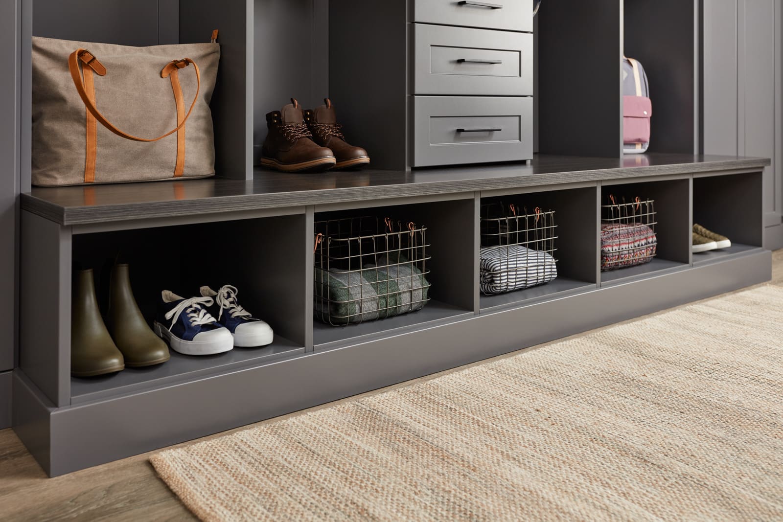 Close up of closet with low shelves displaying items