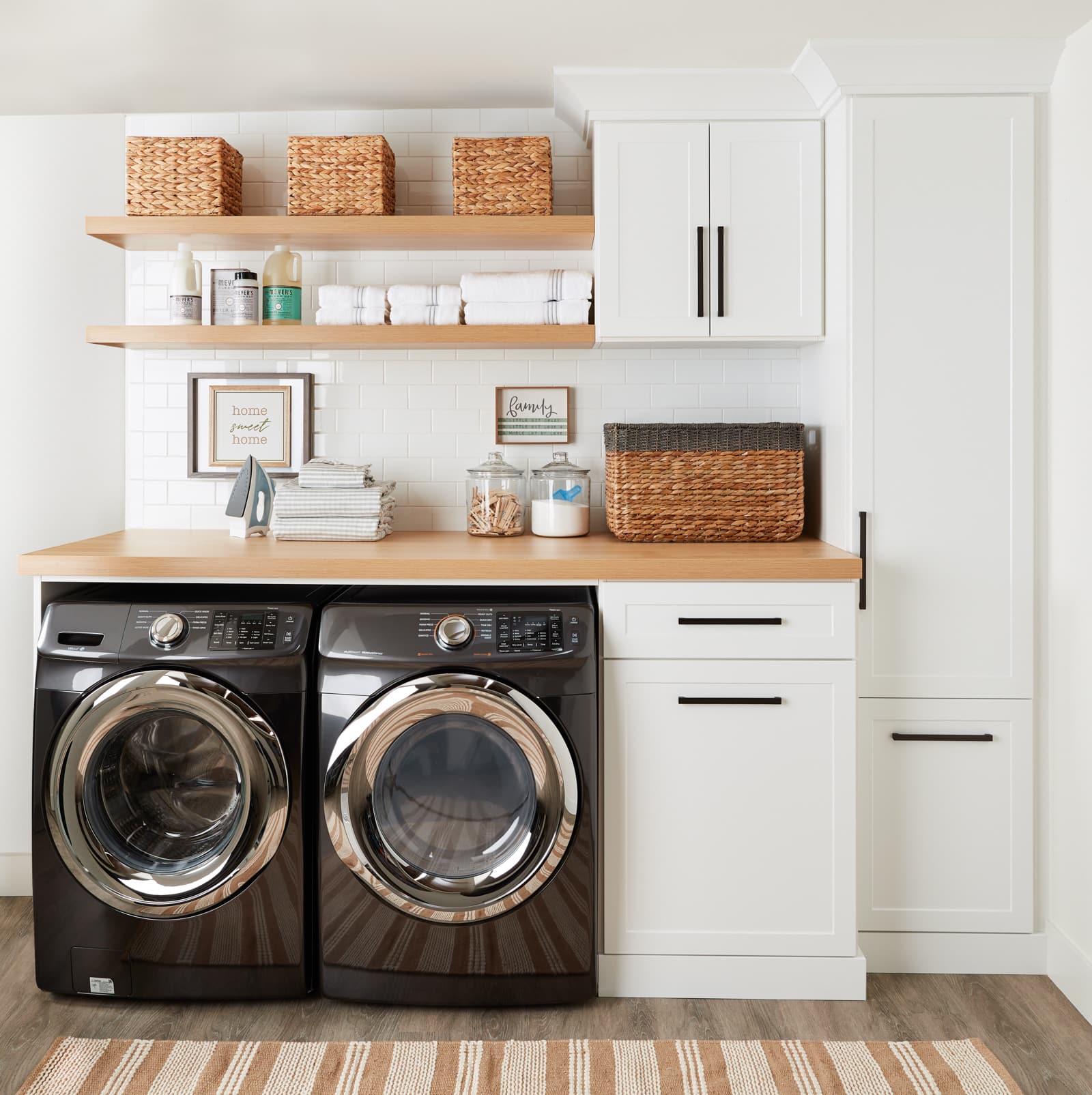 Laundry room cabinets with washer and dryer