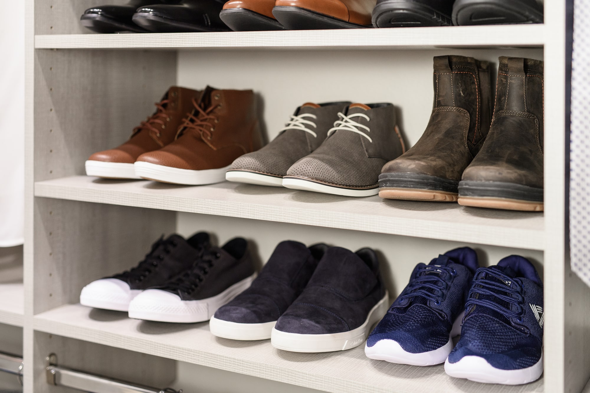 Customwalk inclosetwithbuiltinshelvesforshoestorageinBatonRouge,LA