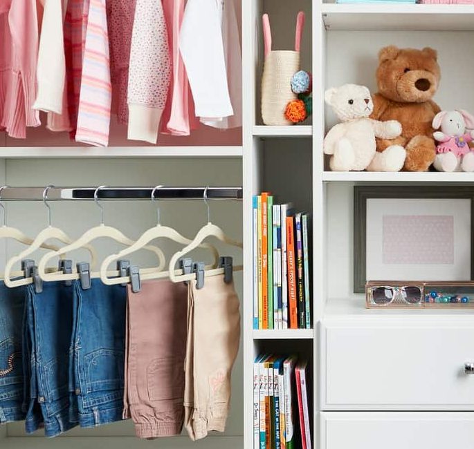 Littlegirlsreach inclosetwithtoysstoragefromInspiredClosets