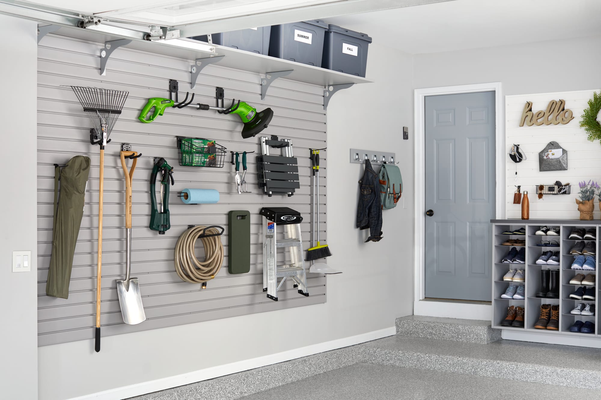 Custom Garage Storage with Sliding Cabinets, Pull Out Drawers and Shelving Storage
