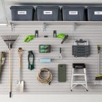 Custom Garage Storage with Sliding Cabinets, Slatwall and Overhead Storage