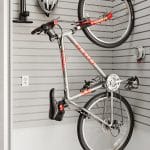 Custom Garage Storage with Sliding Cabinets, Slatwall and Hanging Accessories