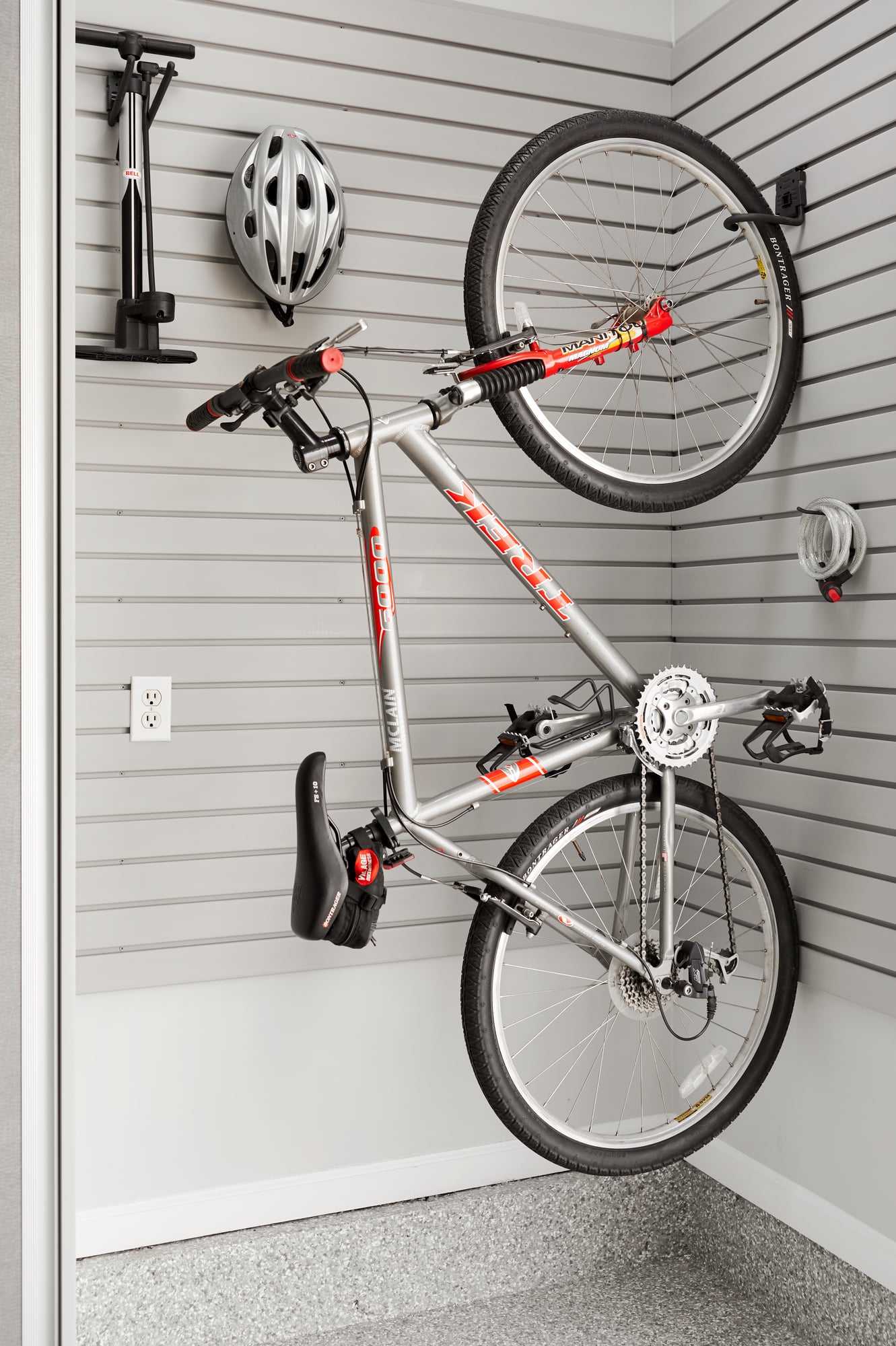 Custom Garage Storage with Sliding Cabinets, Slatwall and Hanging Accessories