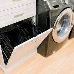 Custom Built Laundry Room Storage with Creative Pull Hamper in Central Virginia