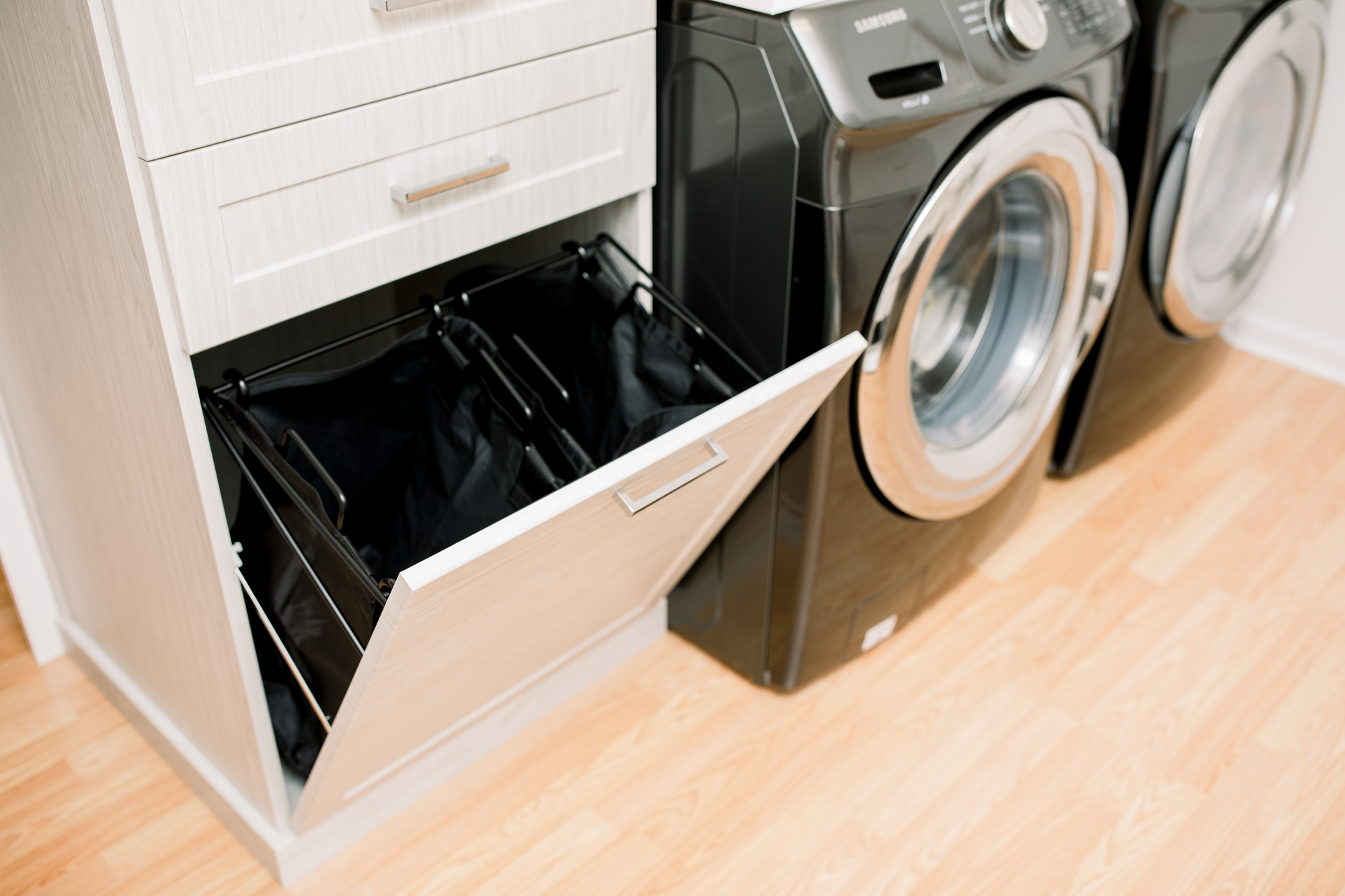 Custom Built Laundry Room Storage with Creative Pull Hamper in Central Virginia