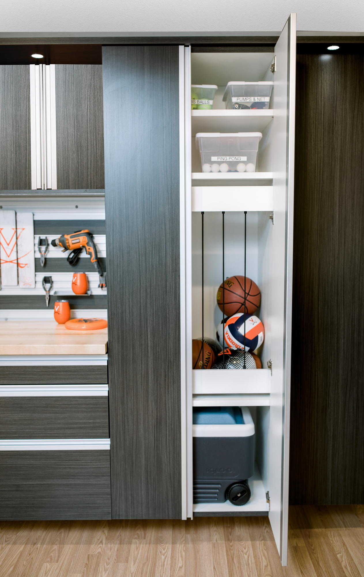 Custom Garage System in Ore with Tall Cabinets for Sports Equipment Richmond, VA