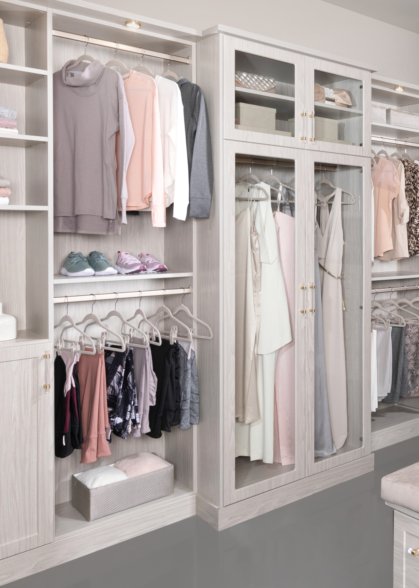 Custom closet hutch storage with hanging rods from Inspired Closets
