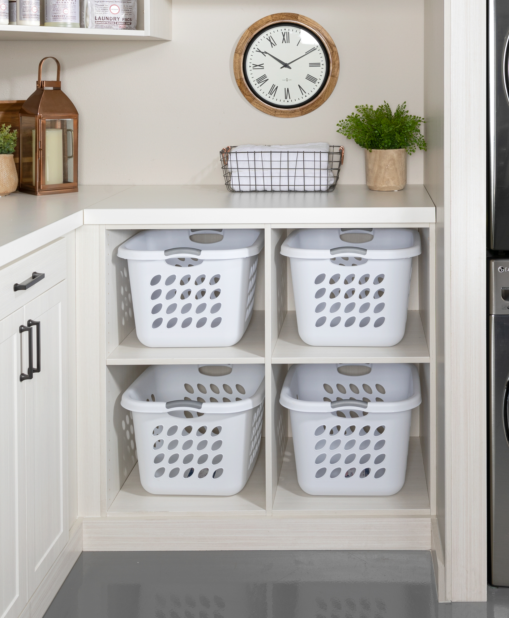 Custom floor mounted boutique laundry room storage with shelving storage