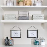 Custom floor mounted boutique laundry room storage easy shelving storage