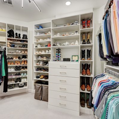 Customwhitewalk inclosetwithshoestorageandbuilt indrawersinOklahomaCity