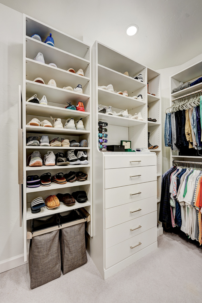 Custom white hutch with drawers and hamper in Oklahoma City