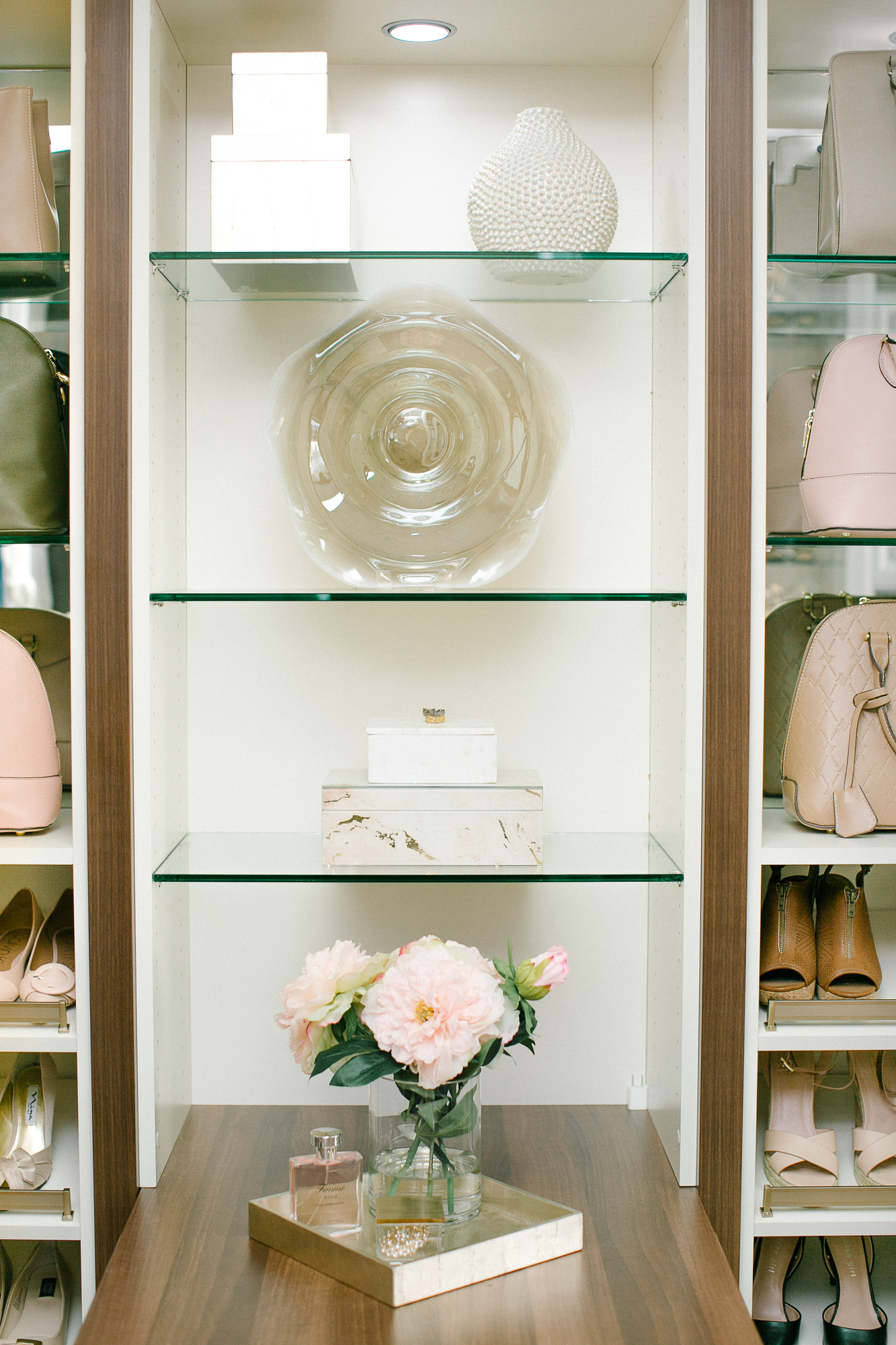 Beautiful glass shelving for a custom closet in Sacramento